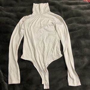 White turtleneck bodysuit